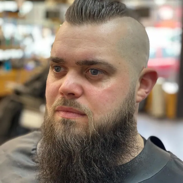 A beard and skin fade at Cutthroat Castles